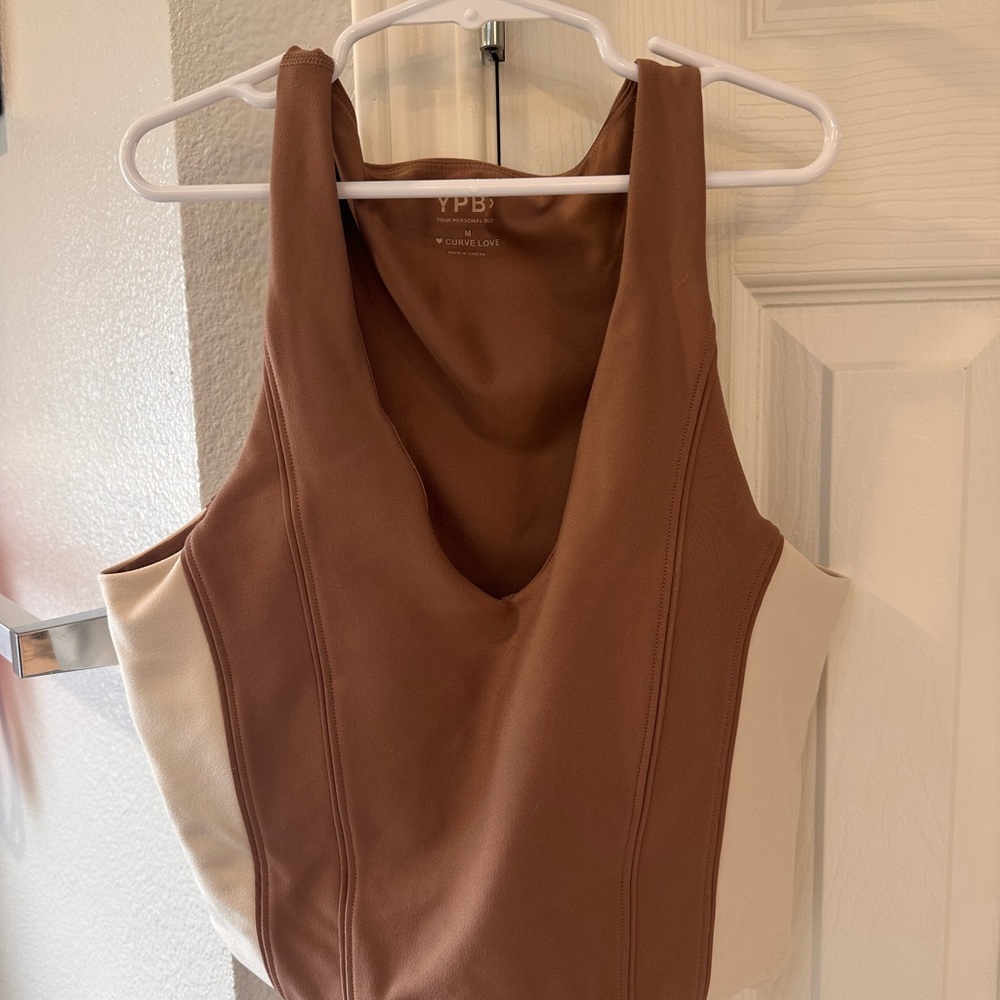 YPB size medium curve love sports bra. Cropped top. Excellent condition.